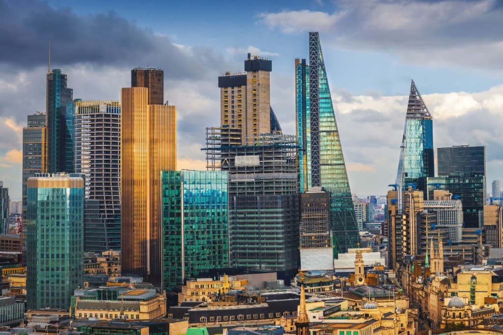 City skyline of landmark commercial towers at dusk