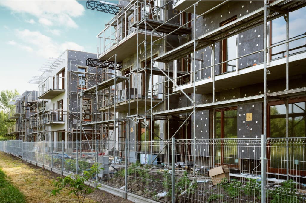 Residential development with scaffolding during construction
